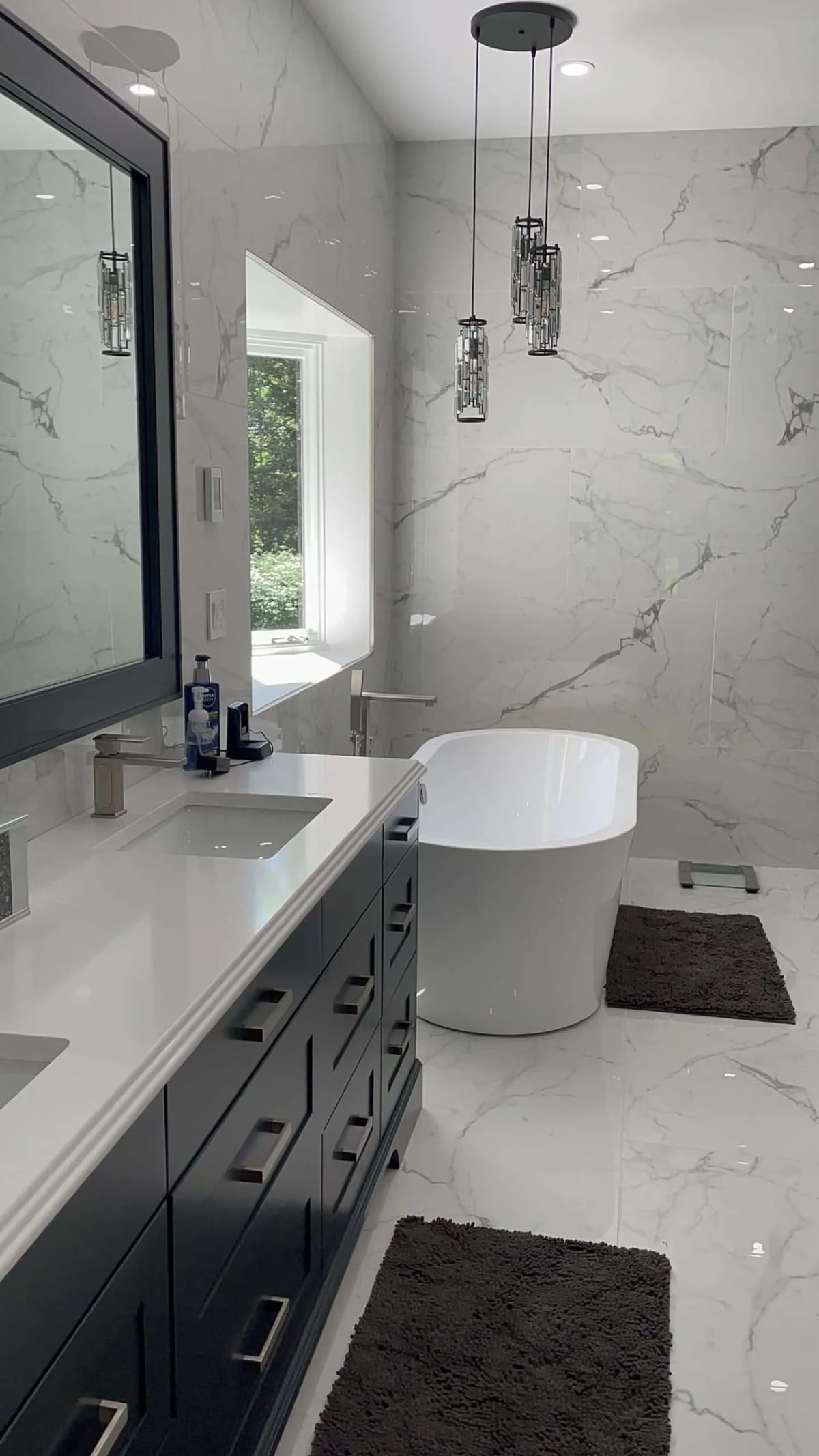 Bathroom remodel: marble-look bath with freestanding tub