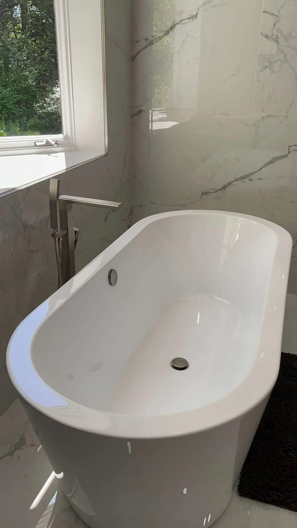 Bathroom remodel: soaking tub with floor-mounted filler