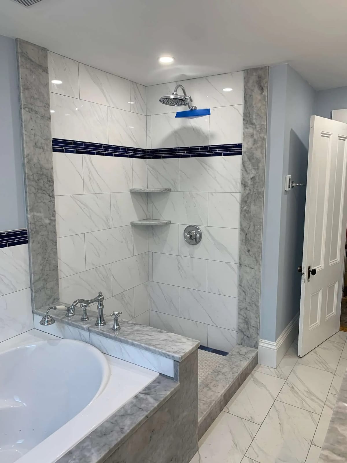 Bathroom remodel: shower with corner shelves