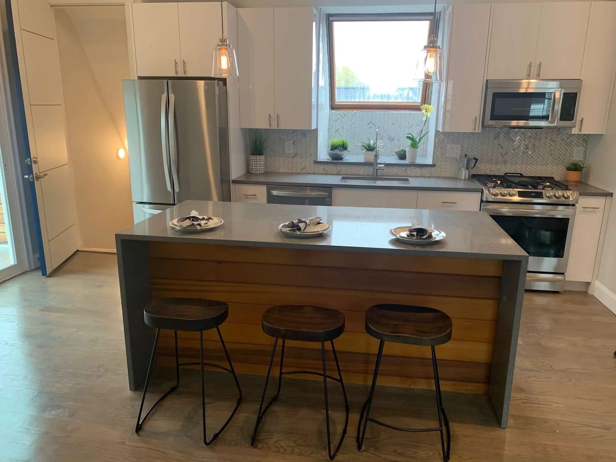 Kitchen remodel: wood-clad island with seating