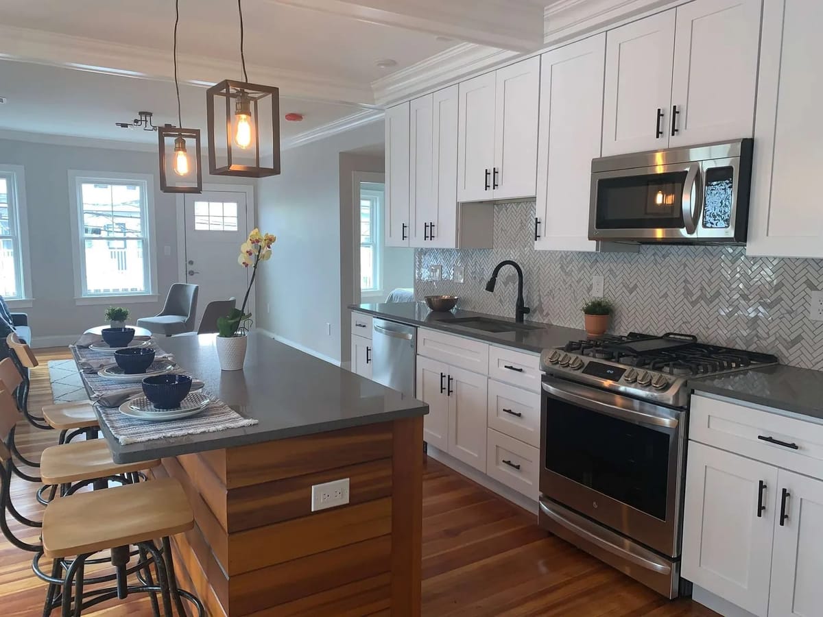 Kitchen remodel: shaker kitchen with herringbone backsplash