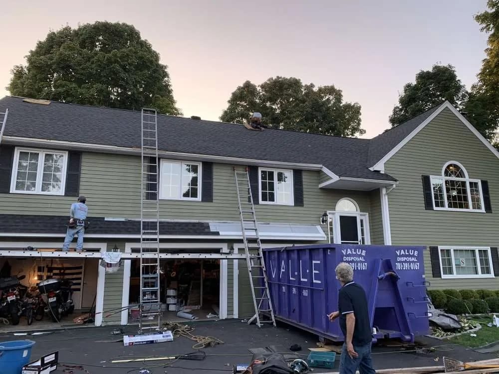 Roof replacement: exterior renovation in progress
